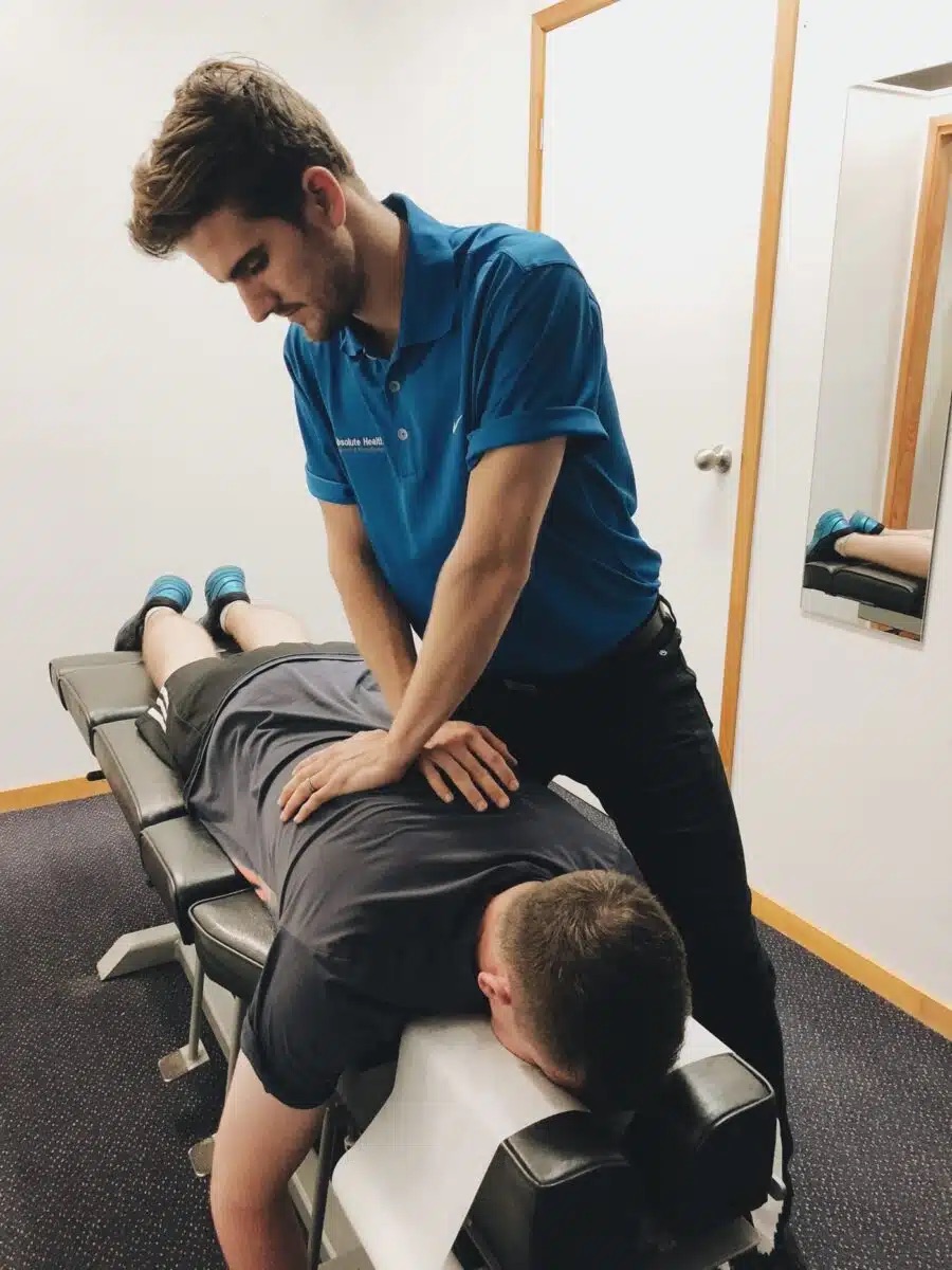 Chiropractor treating a patient at Absolute Health Mooloolaba